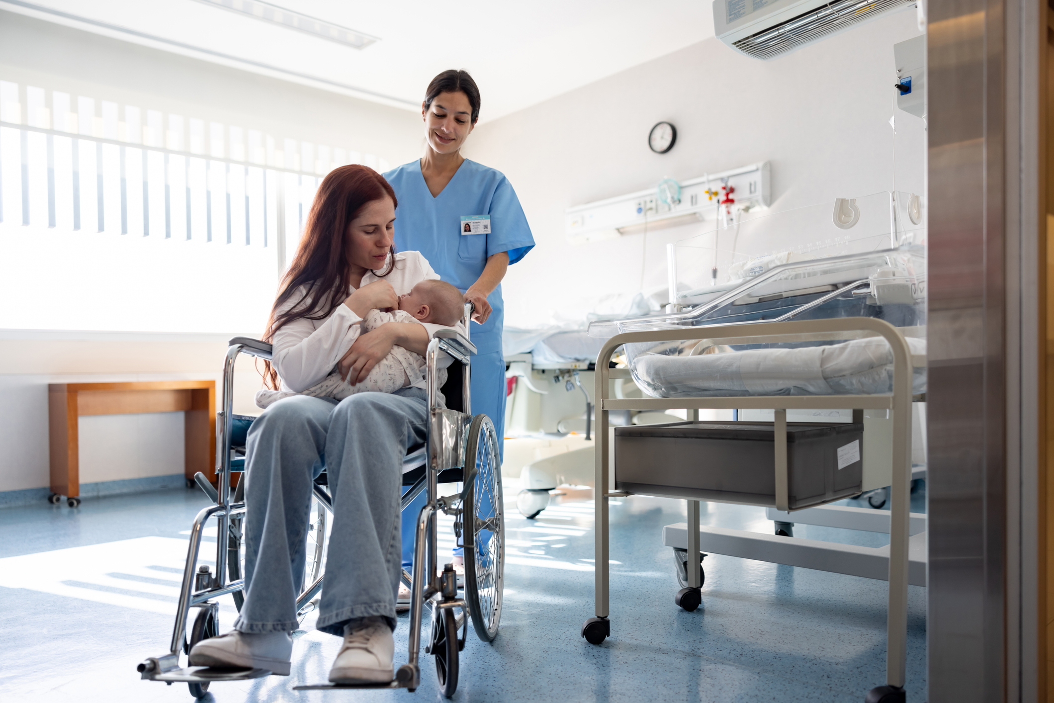Mother and newborn in a hospital nursery